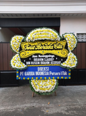 Papan Bunga Duka di Wouma